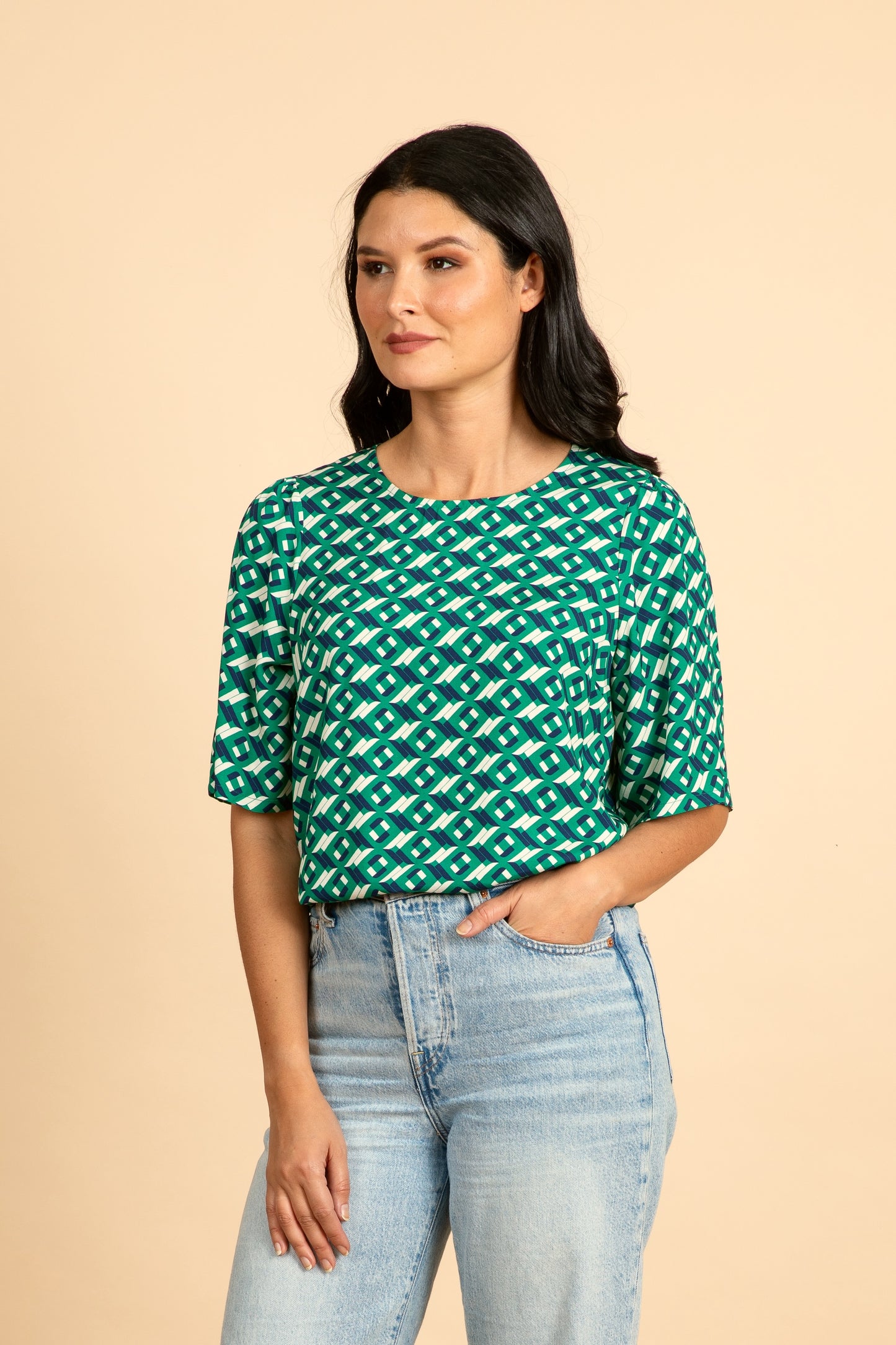 
                  
                    ARCHED Fluted Sleeve Top
                  
                