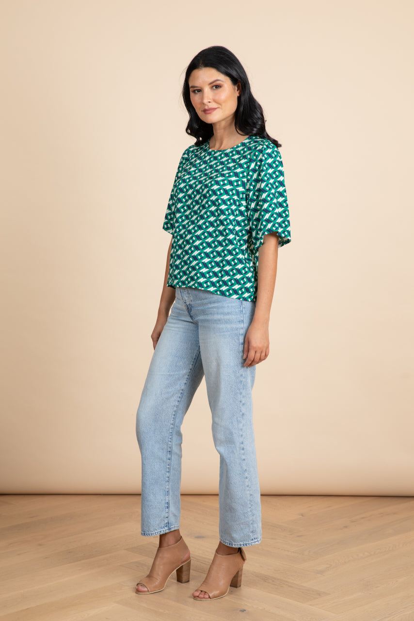 
                  
                    WHOLESALE - ARCHED Fluted Sleeve Top
                  
                