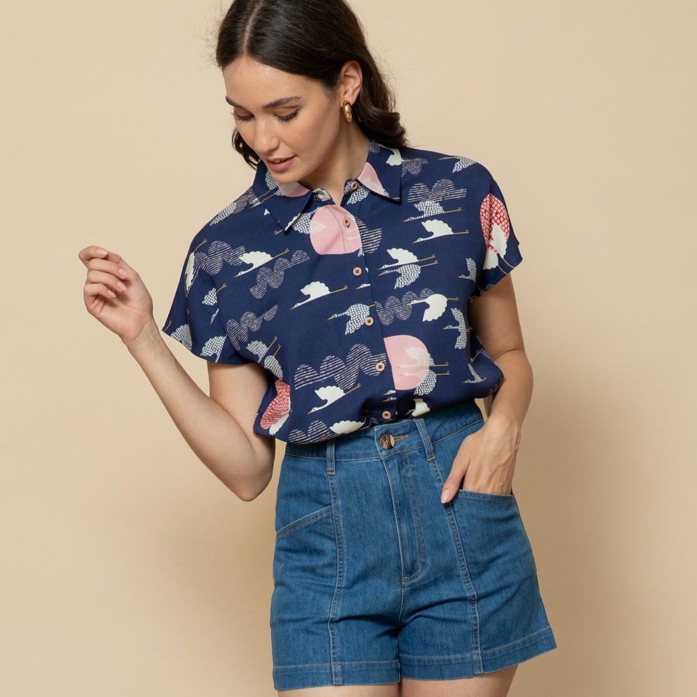 
                      
                        1000 CRANES Capped Sleeve Shirt
                      
                    