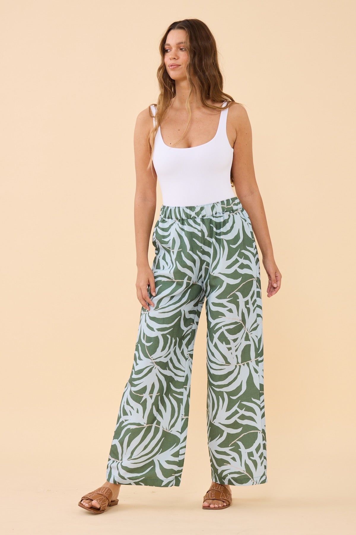 Woman standing wearing the Frock Me Out Lets Be Fronds Pant