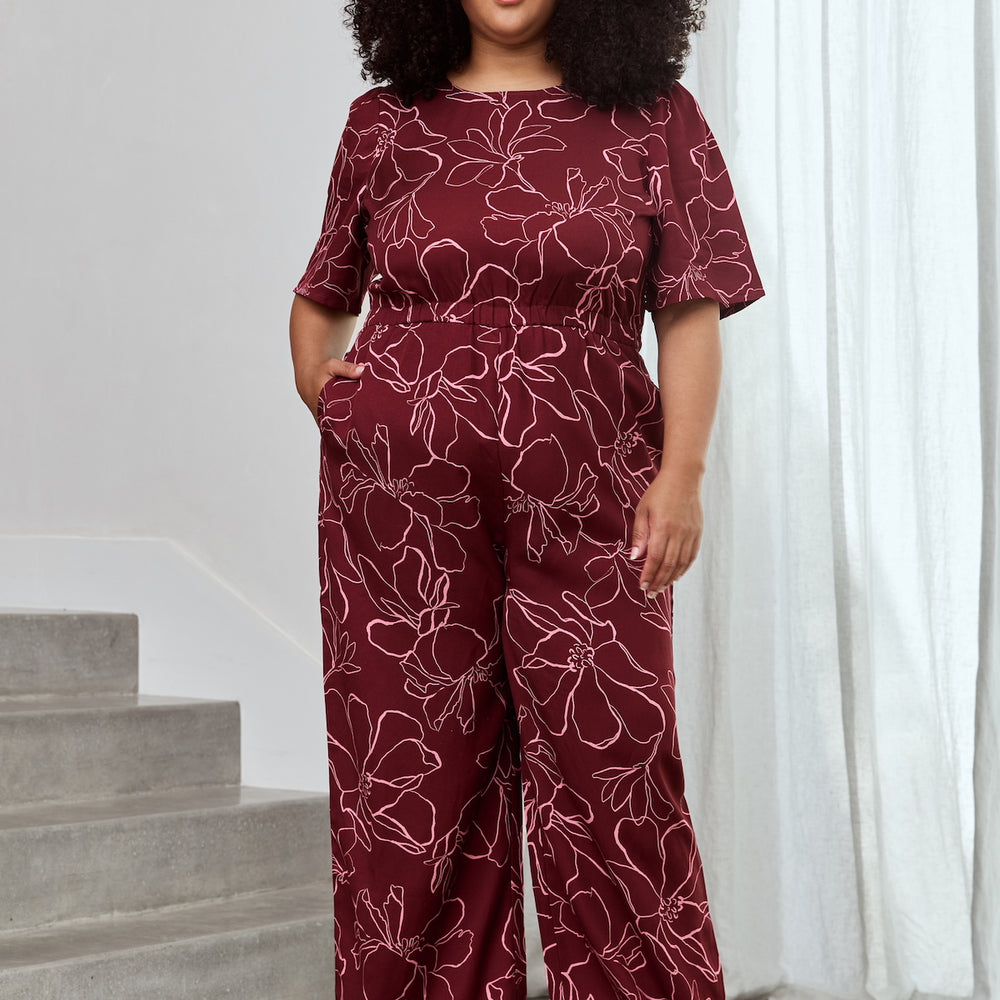 
                      
                        MAGNOLIA Sleevie Wonder Jumpsuit
                      
                    