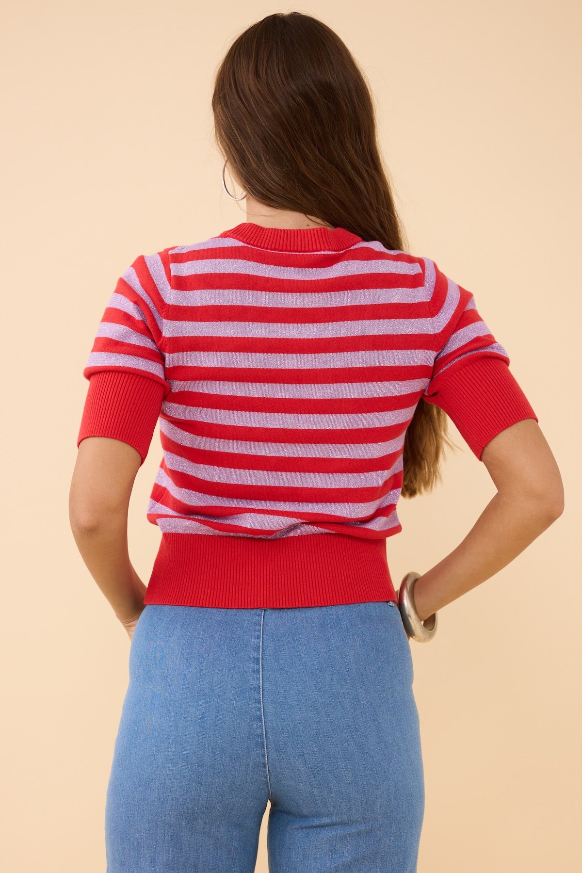 Woman wearing the Frock Me Out RED and DISCO LILAC Stripe Knit 