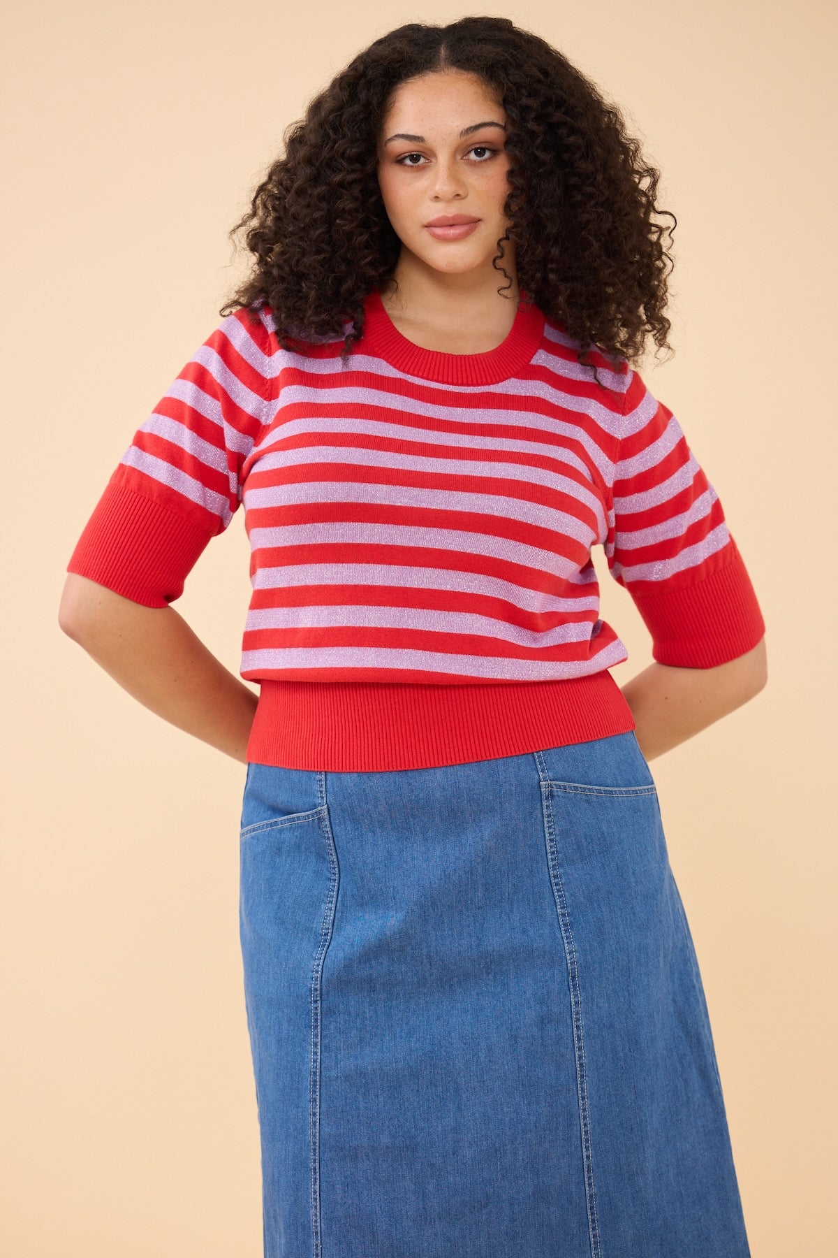 Woman wearing the Frock Me Out RED and DISCO LILAC Stripe Knit 