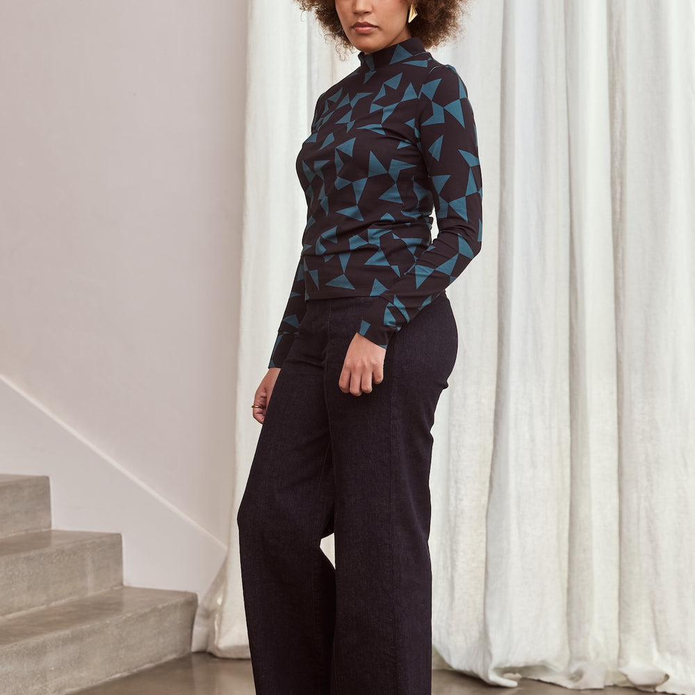 
                      
                        TANGO Mock Neck Top
                      
                    