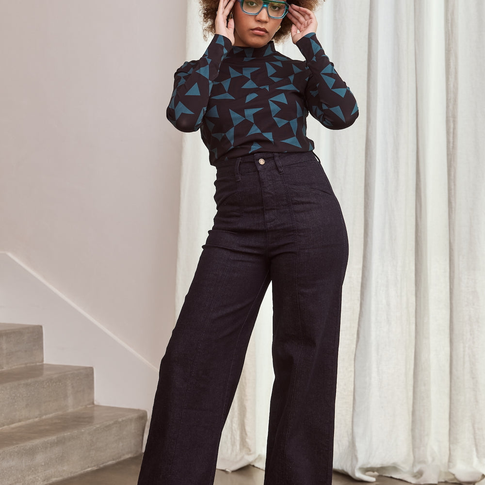 
                      
                        TANGO Mock Neck Top
                      
                    