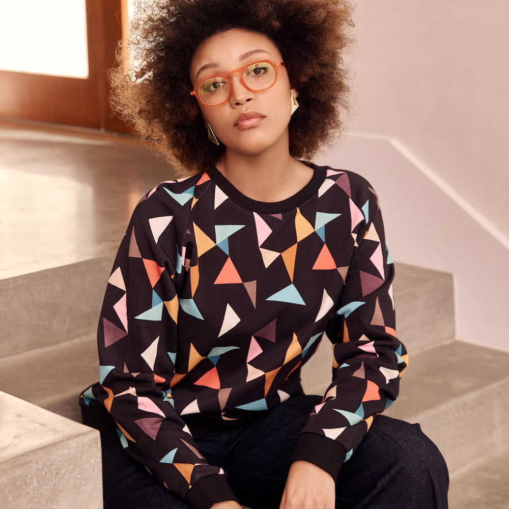 
                      
                        Black and multi colour triangle print jumper
                      
                    