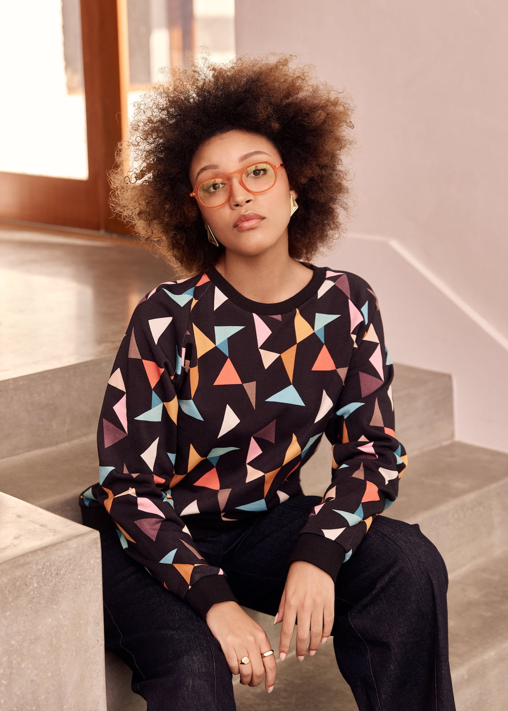Black and multi colour triangle print jumper