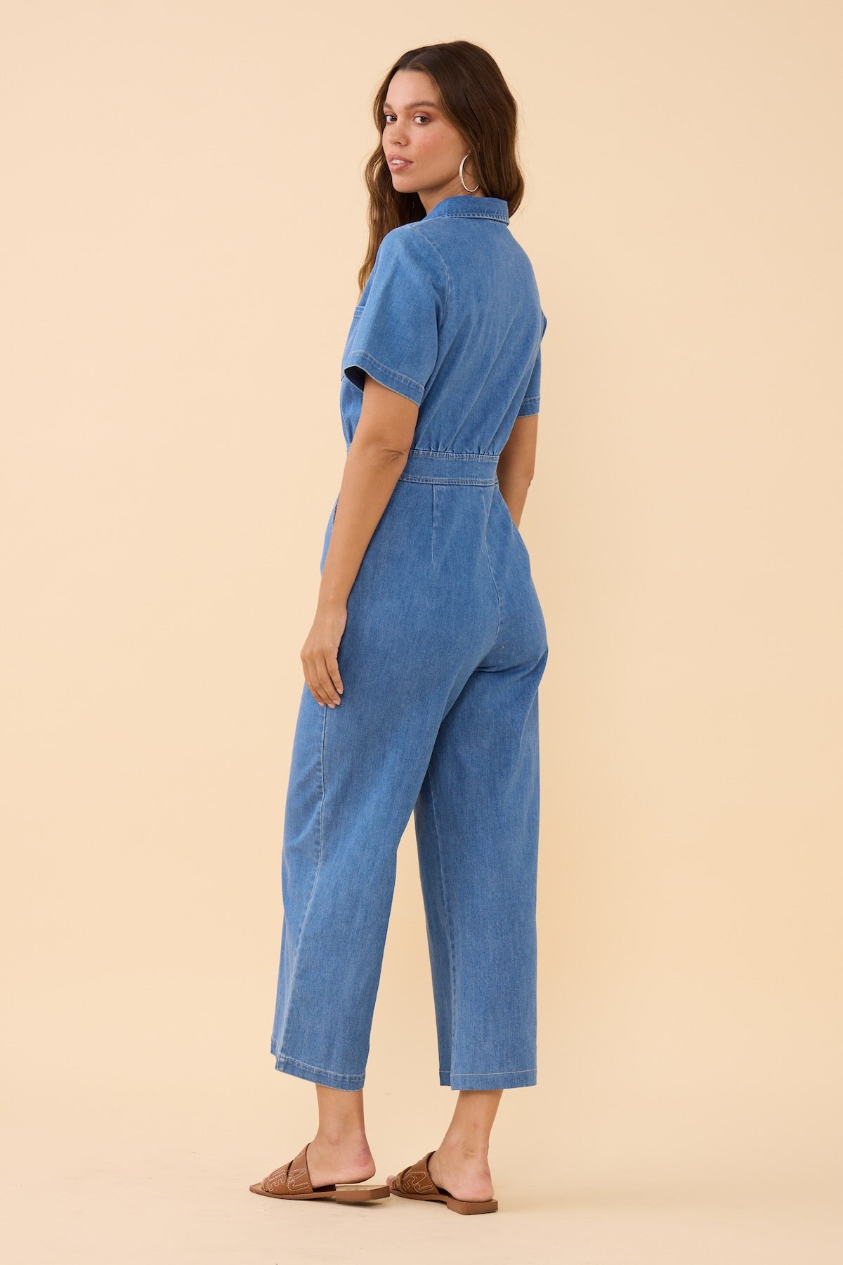 Woman wearing Frock Me Out DENIM Freestyler Jumpsuit (Vintage Wash)