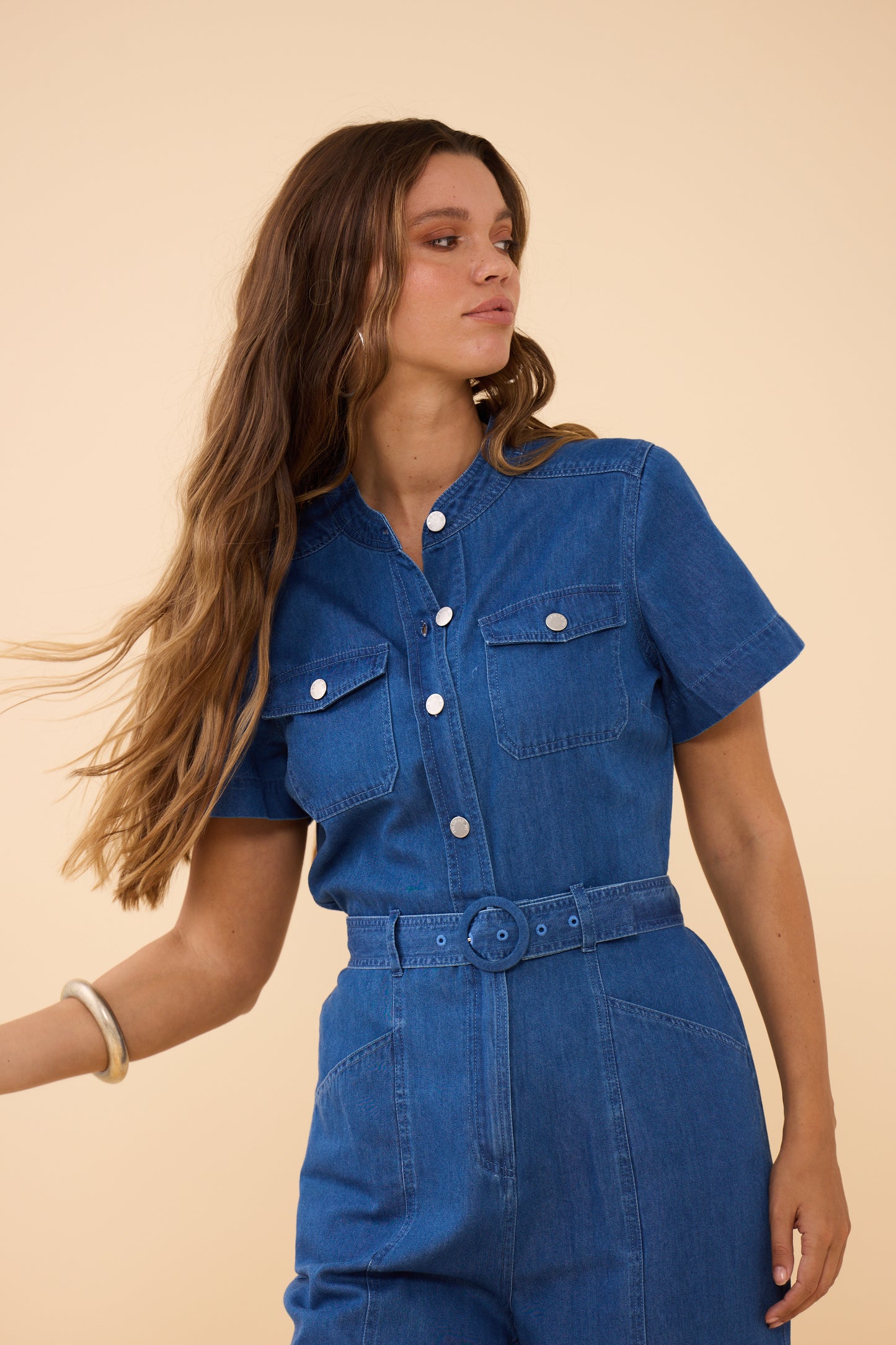 Woman wearing Frock Me Out CHAMBRAY Safari Jumpsuit