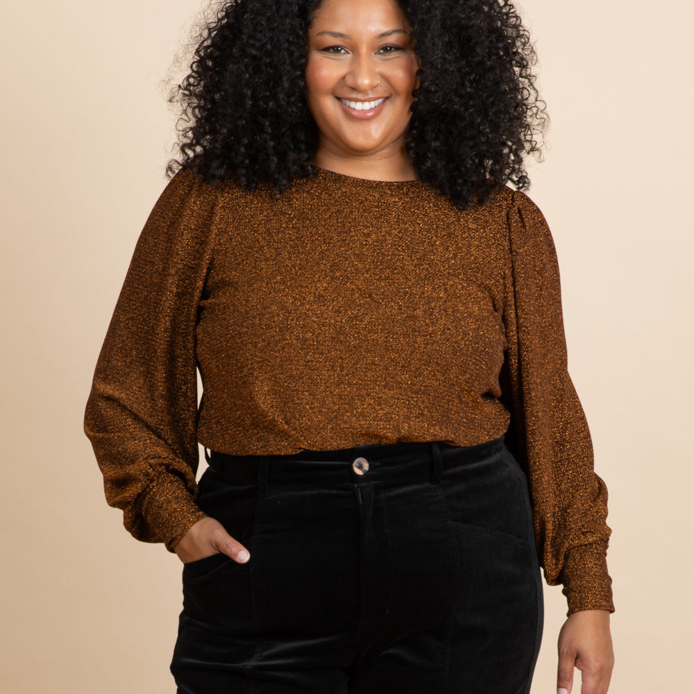 
                      
                        BRONZE GODDESS Bell Sleeve Top
                      
                    