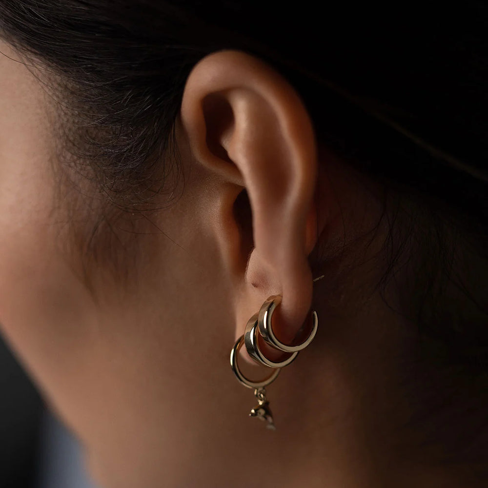 
                      
                        Naomi Murrell Baby Huggies - Sterling Silver
                      
                    